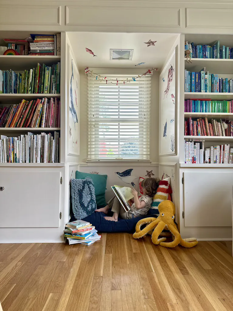 Cozy reading nook with children reading